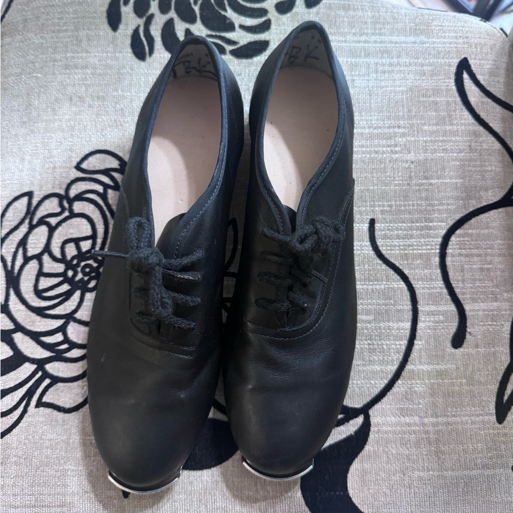 Ms. Stomper 8 wide clogging shoe.